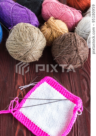 knitting ball of yarn and knitting needles 95180959