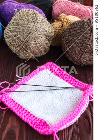 knitting ball of yarn and knitting needles 95180962
