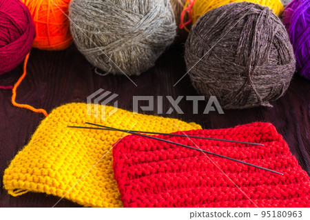 knitting ball of yarn and knitting needles 95180963