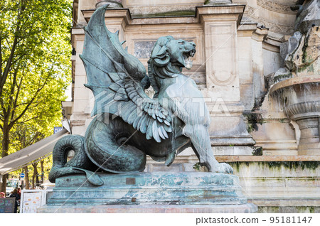 The Fontaine Saint-Michel located in Place Saint-Michel in the 6th arrondissement in Paris, France. Dragon by Henri Alfred Jacquemart in front of Fontaine The Fontaine Saint-Michel located in Place Saint-Michel in the 6th arrondissement in Paris, France. Dragon by Henri Alfred Jacquemart in front of Fontaine 95181147