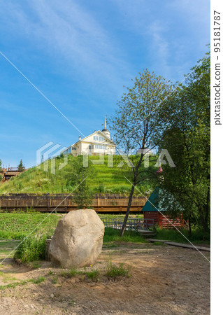 Sacred stone on the background of the church Sacred stone on the background of the church 95181787
