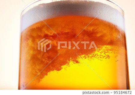 Pouring beer Foam up 95184672