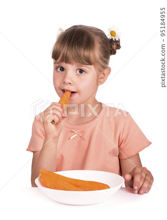 Cute little girl with the carrot on a white background 95184955
