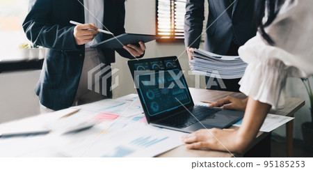 Asian Business consulting meeting and brainstorming new business plan finance investment Asian Business consulting meeting and brainstorming new business plan finance investment 95185253