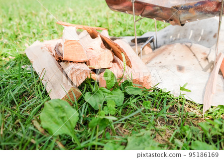 Lawn campsite and firewood for bonfire Lawn campsite and firewood for bonfire 95186169