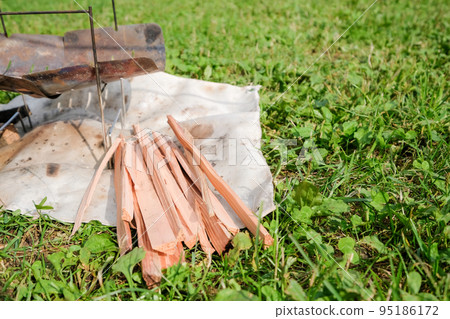 Lawn campsite and firewood for bonfire Lawn campsite and firewood for bonfire 95186172