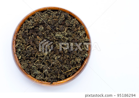 Dried Jiaogulan on white background. 95186294