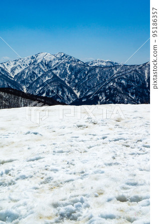 Climbing Mt. Toritate in Fukui Prefecture during the remaining snow season: Mt. Dainichi seen from the summit of Mt. Toritate Climbing Mt. Toritate in Fukui Prefecture during the remaining snow season: Mt. Dainichi seen from the summit of Mt. Toritate 95186357