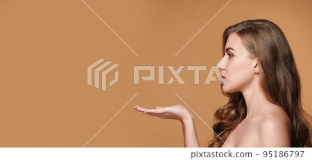 attractive young woman holding on open arm copy space 95186797