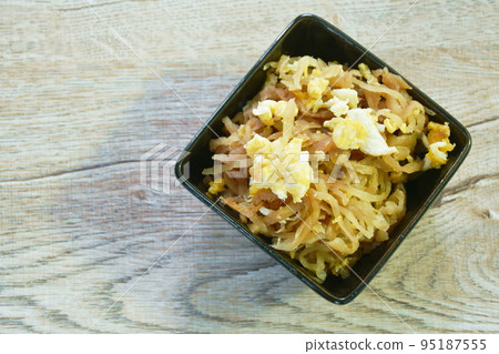 fried slice Chinese sweet pickled cabbage with egg on bowl 95187555