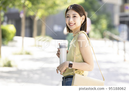 Young woman with my bottle 95188062