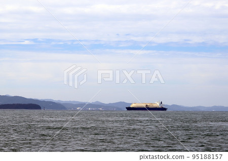 LNG tanker navigating the Tomogashima Channel 95188157