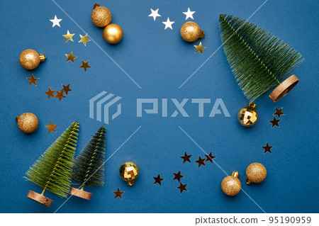 Christmas flat lay scene with golden decorations Christmas flat lay scene with golden decorations 95190959