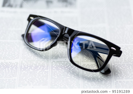 Business image (English newspaper and glasses) Business image (English newspaper and glasses) 95191289