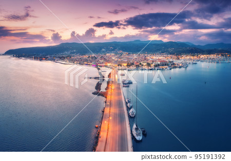Aerial view of road and sea at night in Lefkada island, Greece 95191392