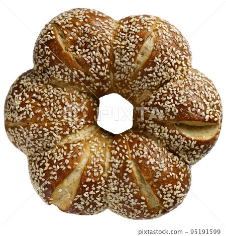Eating continental breakfast - gold bread roll (bagel) with sesame, Eating continental breakfast - gold bread roll (bagel) with sesame, 95191599