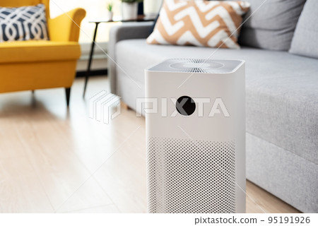 Air purifier in living room, dust protection 95191926