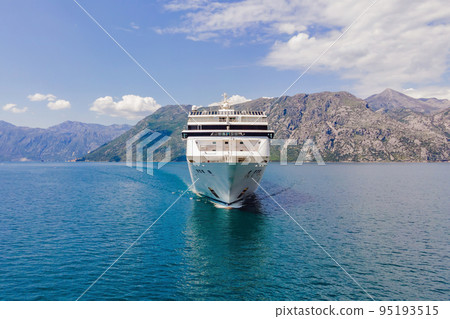 Luxury passenger liner in the bay of Kotor with travel returning after the Covid 19 pandemic 95193515