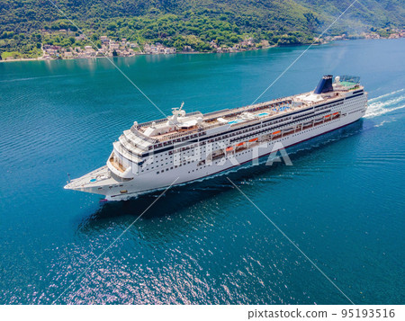 Luxury passenger liner in the bay of Kotor with travel returning after the Covid 19 pandemic 95193516