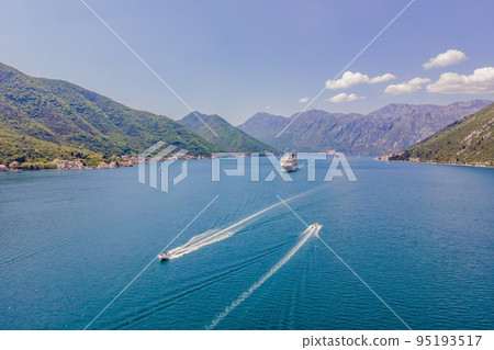 Luxury passenger liner in the bay of Kotor with travel returning after the Covid 19 pandemic 95193517