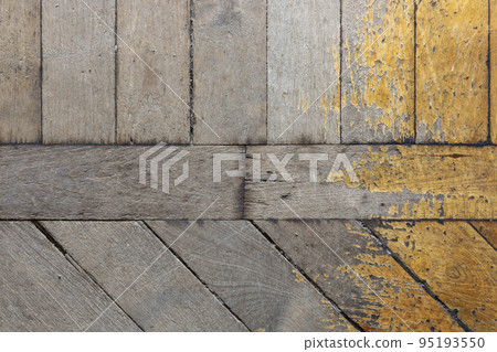 Background, texture of the surface of an old wooden parquet Background, texture of the surface of an old wooden parquet 95193550