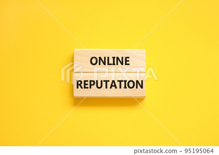Online reputation symbol. Wooden blocks with concept words Online reputation on beautiful yellow background. Business online reputation concept. Copy space. Online reputation symbol. Wooden blocks with concept words Online reputation on beautiful yellow background. Business online reputation concept. Copy space. 95195064