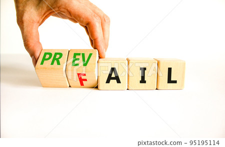 Prevail or fail symbol. Concept words Prevail or Fail on wooden cubes. Businessman hand. Beautiful white table white background. Business prevail or fail concept. Copy space. Prevail or fail symbol. Concept words Prevail or Fail on wooden cubes. Businessman hand. Beautiful white table white background. Business prevail or fail concept. Copy space. 95195114