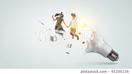 Kids wearing virtual reality goggles Kids wearing virtual reality goggles 95200156