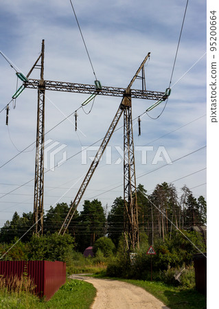 High-voltage power line passing over summer cottages High-voltage power line passing over summer cottages 95200664