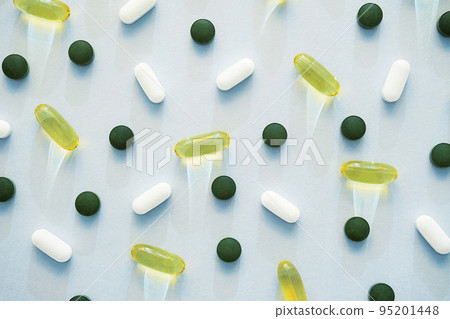Some pills, vitamin capsules or dietary supplement supports for health. 95201448