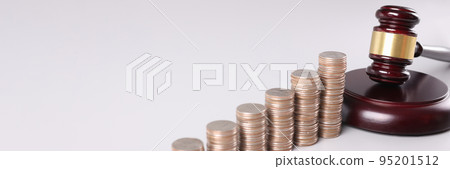 Stacks of coins and court gavel financial crimes Stacks of coins and court gavel financial crimes 95201512