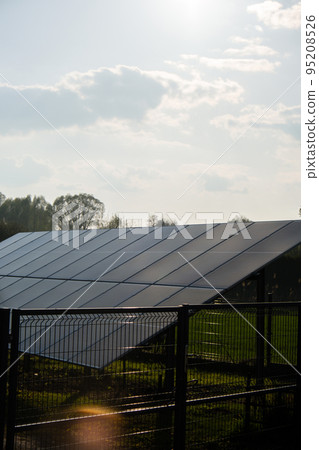 New ecologic house with solar panels Alternative to conventional energy. The battery is charged from a solar cell Advertisement Green energy Sustainable life Renewable  95208526