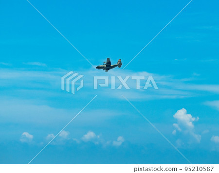 Air transport aircraft C130 flying in the sky Air transport aircraft C130 flying in the sky 95210587