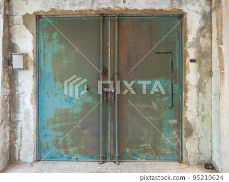 Rusty old iron gate 95210624