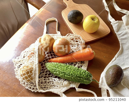 Eco bag and vegetables on the table Eco bag and vegetables on the table 95211040