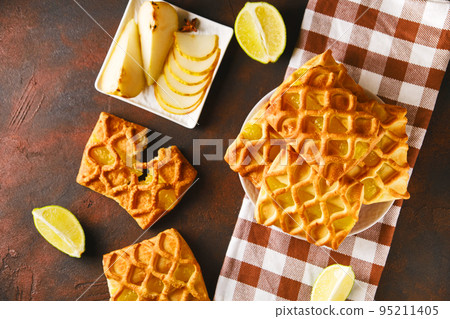 Fresh puff pastry mini pies with pear and lime jam 95211405