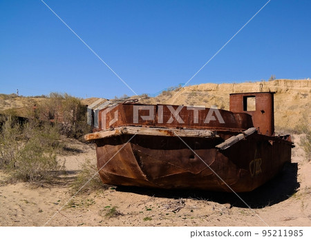 Panorama of ship cemetery near Moynaq at sunrise, Karakalpakstan, Uzbekistan Panorama of ship cemetery near Moynaq at sunrise, Karakalpakstan, Uzbekistan 95211985