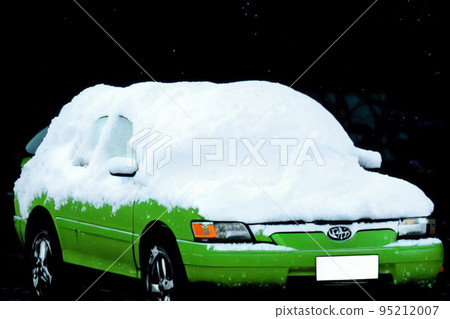 Car buried in snow Car buried in snow 95212007