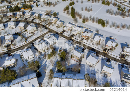 This American small town in New Jersey, there are residential complexes with snow covered roofs after severe snowstorm hit the area, leaving This American small town in New Jersey, there are residential complexes with snow covered roofs after severe snowstorm hit the area, leaving 95214014