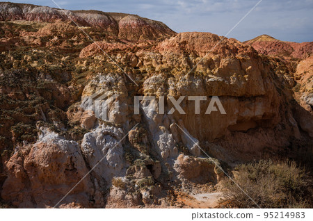 Landscape of multi-colored clay dunes. Mars on earth. 95214983
