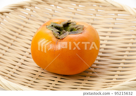 persimmon in a basket persimmon in a basket 95215632