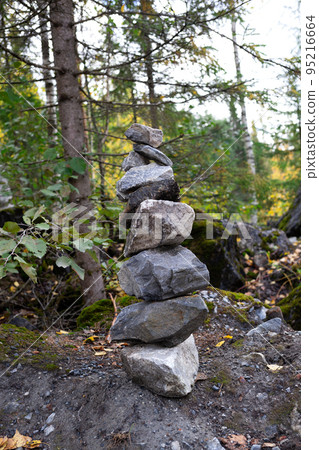 Balancing stones in equilibrium in the forest 95216664