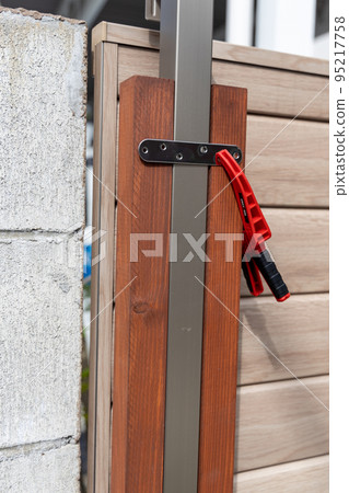 Do-it-yourself building a wooden fence Do-it-yourself building a wooden fence 95217758