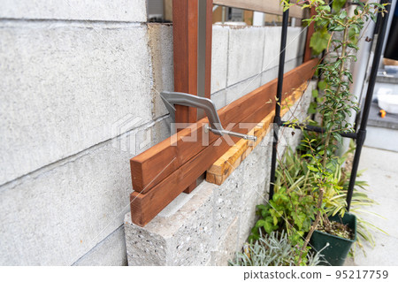 Do-it-yourself building a wooden fence Do-it-yourself building a wooden fence 95217759