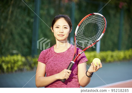 portrait of young female asian tennis player portrait of young female asian tennis player 95218285