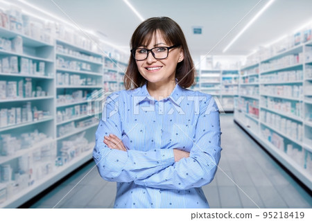 Woman posing in store with medical care professional cosmetics, medicines 95218419