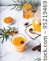 Homemade sea buckthorn tea with honey, ginger and spices 95219469