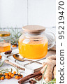 Homemade sea buckthorn tea with honey, ginger and spices 95219470