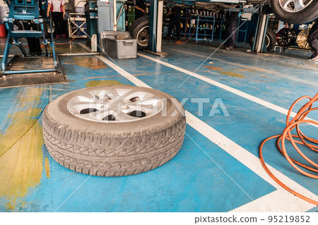 auto tire replacement at car service centre repair shop auto tire replacement at car service centre repair shop 95219852