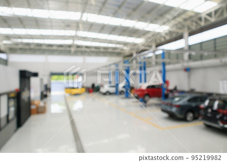 car service centre with auto at repair station bokeh light defocused blur background car service centre with auto at repair station bokeh light defocused blur background 95219982